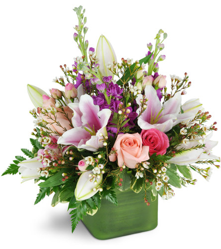 May Flowers. An arrangement by Avenue Flowers and Gifts. Your gift will include stunning pink roses, lilies, alstroemeria, and more..