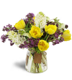 With Tulips on Top™. An arrangement by Avenue Flowers and Gifts.