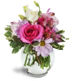 Fondly Fuchsia™. An arrangement by Avenue Flowers and Gifts.