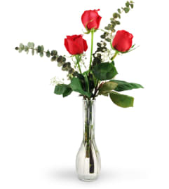 Three Red Roses. An arrangement by Avenue Flowers and Gifts.