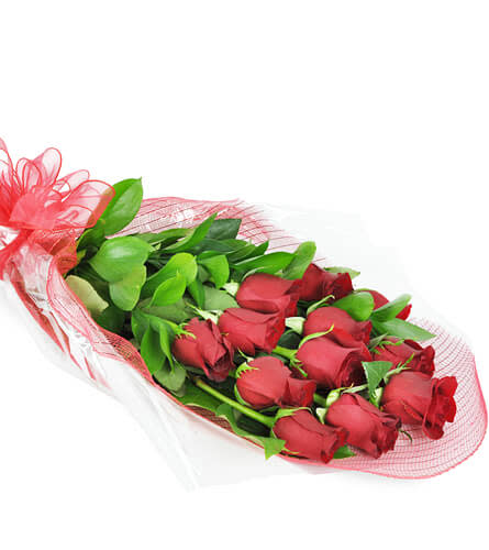 Perfect Wrapped Long-Stemmed Red Roses. An arrangement by Avenue Flowers and Gifts. One dozen long-stemmed roses arrive beautifully wrapped and...