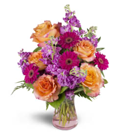 Invigorate™. An arrangement by Avenue Flowers and Gifts.