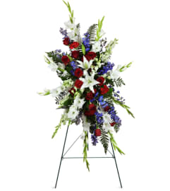 Gentle Repose Lily Spray™. An arrangement by Avenue Flowers and Gifts.