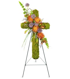 Natural Beauty Sympathy Cross™. An arrangement by Avenue Flowers and Gifts.
