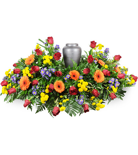Bright Memories Urn Spray. An arrangement by Avenue Flowers and Gifts. Two dozen roses are arranged with Gerbera daisies, mums, asters, and more..