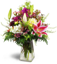 Spring’s Bounty Bouquet™. An arrangement by Avenue Flowers and Gifts.