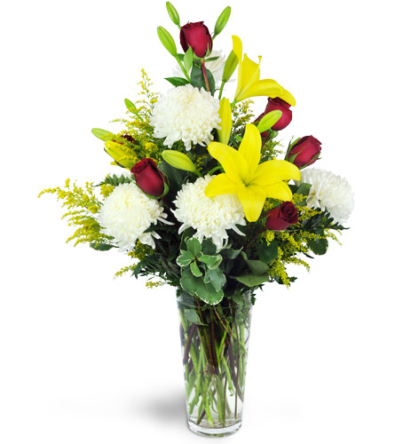 Splendid Admiration™. An arrangement by Avenue Flowers and Gifts. Bright yellow lilies, fluffy white chrysanthemums, and elegant red roses are...