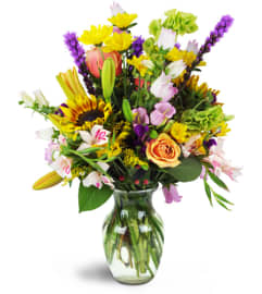 Summer's Sweet Song™. An arrangement by Avenue Flowers and Gifts.