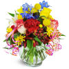 Celebrating You!™ - Standard. An arrangement by Avenue Flowers and Gifts. Roses, carnations, lilies, and more are arranged in a glass vase..