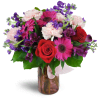 My One and Only™ - Deluxe. An arrangement by Avenue Flowers and Gifts. Featuring bright pink mini gerbera daisies, delicate pink carnations,...