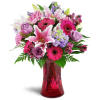 Bright Medley™ - Deluxe. An arrangement by Avenue Flowers and Gifts. This arrangement includes a lively combination of Stargazer lilies, bright...