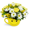 Full of Smiles - Standard. An arrangement by Avenue Flowers and Gifts. Yellow carnations, white daisies, and solidago are arranged in a...