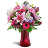 Bright Medley™ - Standard. An arrangement by Avenue Flowers and Gifts. This arrangement includes a lively combination of Stargazer lilies, bright...