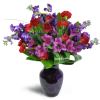 Romance Medley™ - Standard. An arrangement by Avenue Flowers and Gifts. Purple Peruvian lilies are arranged with stunning red spray roses and...