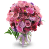 Purple Moon - Premium. An arrangement by Avenue Flowers and Gifts. Roses, carnations, chrysanthemums, and statice in shades of pleasing purples...
