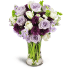 Serene Paradise™ - Premium. An arrangement by Avenue Flowers and Gifts. White tulips, Bells of Ireland, and more are beautifully arranged in a...