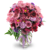 Purple Moon - Deluxe. An arrangement by Avenue Flowers and Gifts. Roses, carnations, chrysanthemums, and statice in shades of pleasing purples are...