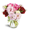Joyful Heart™ - Standard. An arrangement by Avenue Flowers and Gifts. Bring joy to all with pink roses, lisianthus, stock, and red carnations..