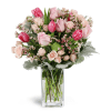 Sweetly Scented Pinks™ - Deluxe. An arrangement by Avenue Flowers and Gifts. Gift them an abundance of pink roses, spray roses, tulips, waxflower,...