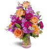 Invigorate™ - Premium. An arrangement by Avenue Flowers and Gifts. This eye-catching arrangement includes roses, mini Gerbera daisies, and more..