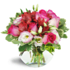 Cupid's Arrow™ - Standard. An arrangement by Avenue Flowers and Gifts. Pink roses, creamy lisianthus, lush red alstroemeria, and more burst from a...